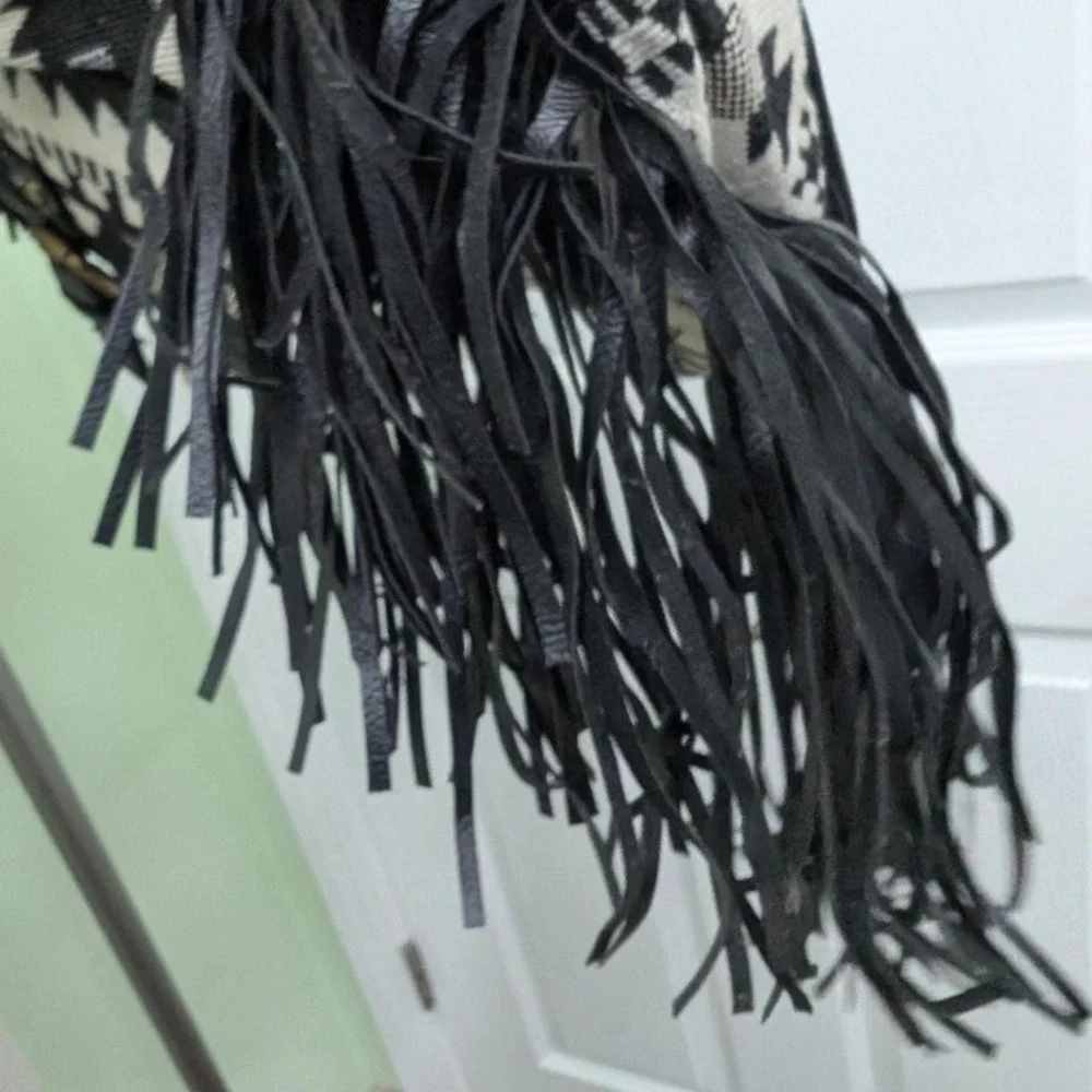 Union Bay black leather backpack with fringe and Aztec print‎